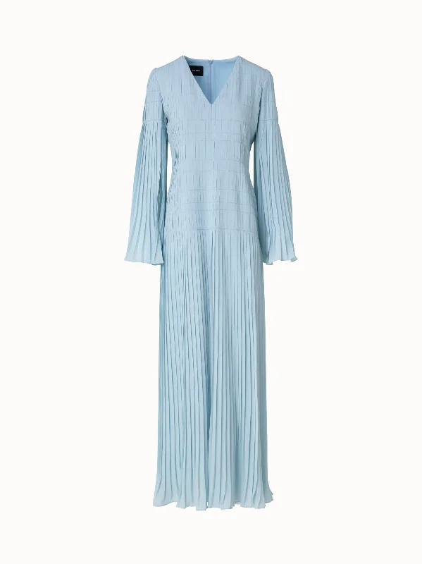 Classic trench coat dresses & jumpsuits for a chic lookLong Pleated Gown with Long Flared Sleeves